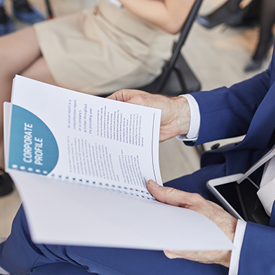 People reviewing financial documents in a meeting